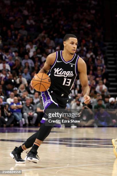 Keegan Murray of the Sacramento Kings dribbles the ball against the LA Clippers at Golden 1 Center on April 02, 2024 in Sacramento, California. NOTE...