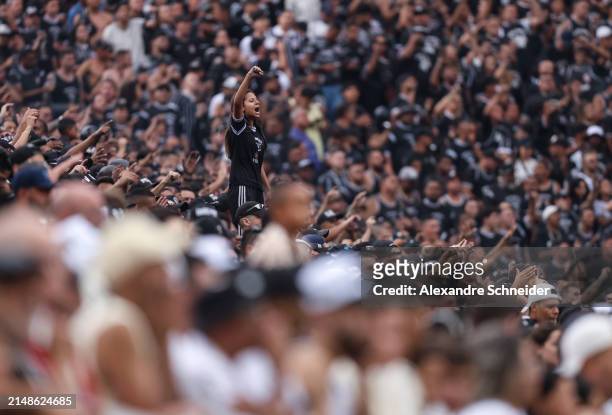 Fans of Corinthians cheer during a match between Corinthians and Atletico MG as part of Brasileirao Series A at Neo Quimica Arena on April 14, 2024...