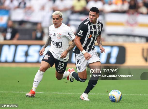 Paulinho of Atletico MG and Fagner of Corinthians fight for the ball during a match between Corinthians and Atletico MG as part of Brasileirao Series...
