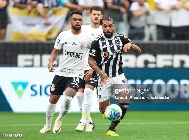 Raniele of Corinthians and Otavio of Atletico MG fight for the ball during a match between Corinthians and Atletico MG as part of Brasileirao Series...