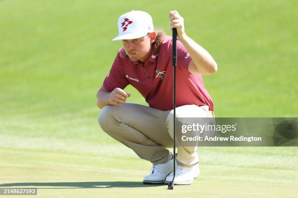 Cameron Smith of Australia lines up a putt on the eighth green during the final round of the 2024 Masters Tournament at Augusta National Golf Club on...