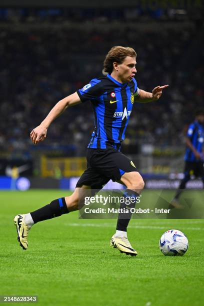 Nicolo Barella of FC Internazionale in action during the Serie A TIM match between FC Internazionale and Cagliari at Stadio Giuseppe Meazza on April...