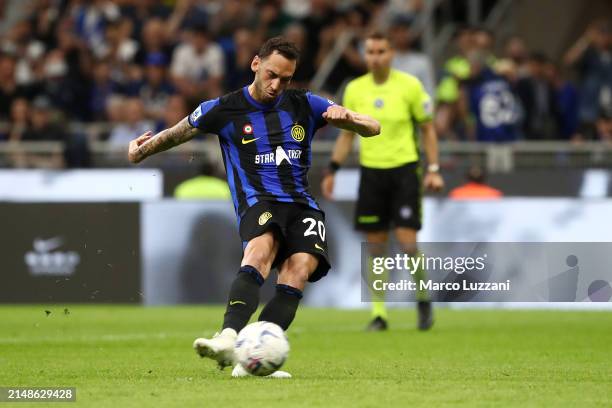 Hakan Calhanoglu of FC Internazionale scores his team's second goal from a penalty kick during the Serie A TIM match between FC Internazionale and...