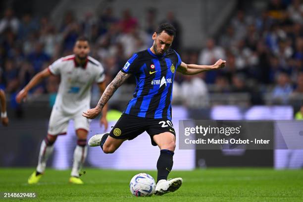 Hakan Calhanoglu of FC Internazionale scores their team's second goal during the Serie A TIM match between FC Internazionale and Cagliari at Stadio...