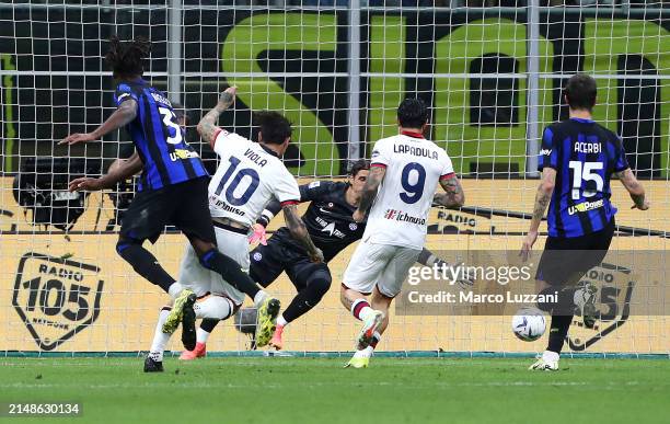 Nicolas Viola of Cagliari Calcio scores his team's second goal past Yann Sommer of FC Internazionale during the Serie A TIM match between FC...