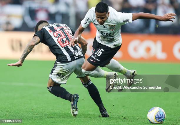 Saravia of Atletico MG and Wesley of Corinthians fight for the ball during a match between Corinthians and Atletico MG as part of Brasileirao Series...