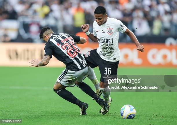 Saravia of Atletico MG and Wesley of Corinthians fight for the ball during a match between Corinthians and Atletico MG as part of Brasileirao Series...