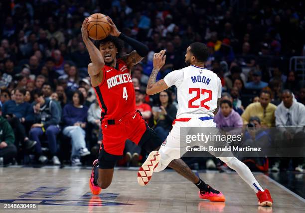 Jalen Green of the Houston Rockets controls the ball against Xavier Moon of the LA Clippers in the first half at Crypto.com Arena on April 14, 2024...