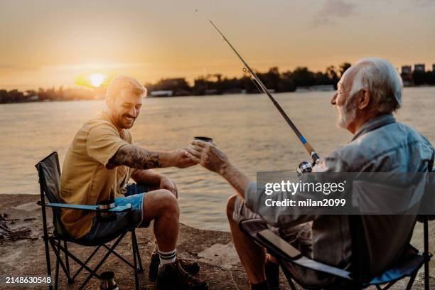 fishing time - fishing rod stock pictures, royalty-free photos & images