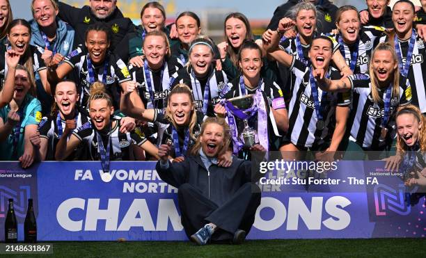 Amanda Staveley, Co-Owner of Newcastle United, and players of Newcastle United, pose for a photo with The FA Women's National League Northern Premier...