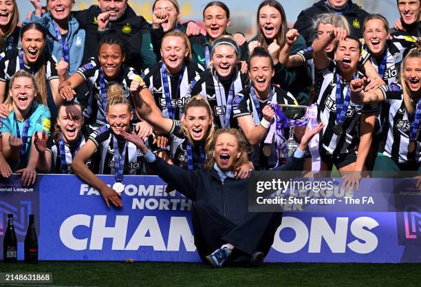 Amanda Staveley, Co-Owner of Newcastle United, and players of Newcastle United, pose for a photo with The FA Women's National League Northern Premier...