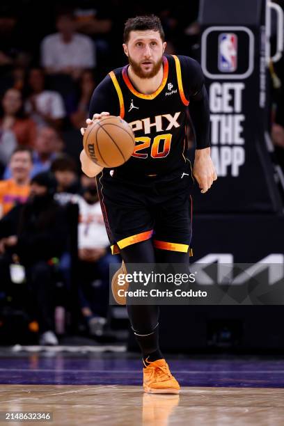 Jusuf Nurkic of the Phoenix Suns controls the ball during the game against the Cleveland Cavaliers at Footprint Center on April 03, 2024 in Phoenix,...