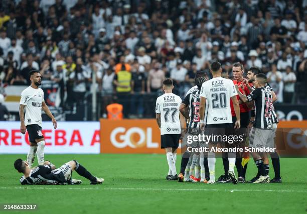 Players of Atletico MG and of Corinthians argue with the referee during a match between Corinthians and Atletico MG as part of Brasileirao Series A...