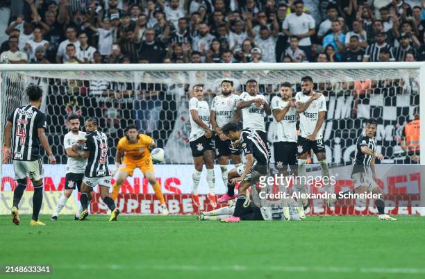 Gustavo Scarpa of Atletico MG shoots at goal during a match between Corinthians and Atletico MG as part of Brasileirao Series A at Neo Quimica Arena...