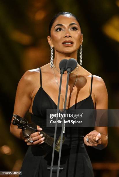 Nicole Scherzinger with the Best Actress in a Musical award on stage during The Olivier Awards 2024 at The Royal Albert Hall on April 14, 2024 in...