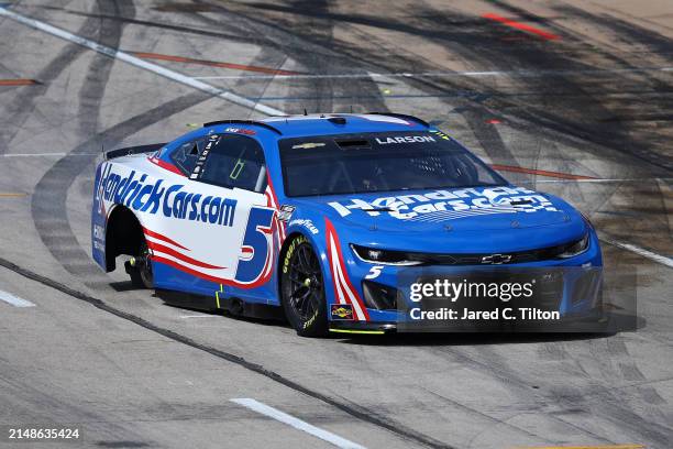 Kyle Larson, driver of the HendrickCars.com Chevrolet, pits after an on-track incident during the NASCAR Cup Series AutoTrader EchoPark Automotive...