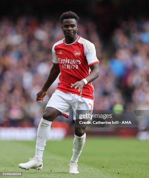 Bukayo Saka of Arsenal during the Premier League match between Arsenal FC and Aston Villa at Emirates Stadium on April 14, 2024 in London, England.