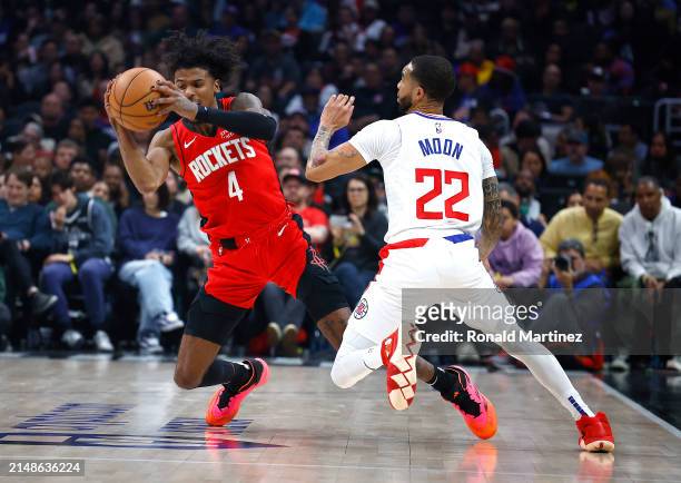 Jalen Green of the Houston Rockets controls the ball against Xavier Moon of the LA Clippers in the first half at Crypto.com Arena on April 14, 2024...
