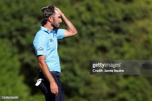 Max Homa of the United States walks off the 12th tee during the final round of the 2024 Masters Tournament at Augusta National Golf Club on April 14,...