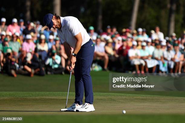 Tommy Fleetwood of England putts on the 18th green during the final round of the 2024 Masters Tournament at Augusta National Golf Club on April 14,...