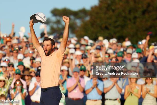 Scottie Scheffler of the United States celebrates on the 18th green after winning the 2024 Masters Tournament at Augusta National Golf Club on April...
