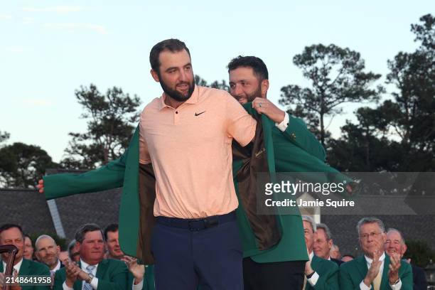 Scottie Scheffler of the United States is awarded the Green Jacket by 2023 Masters champion Jon Rahm of Spain during the Green Jacket Ceremony after...