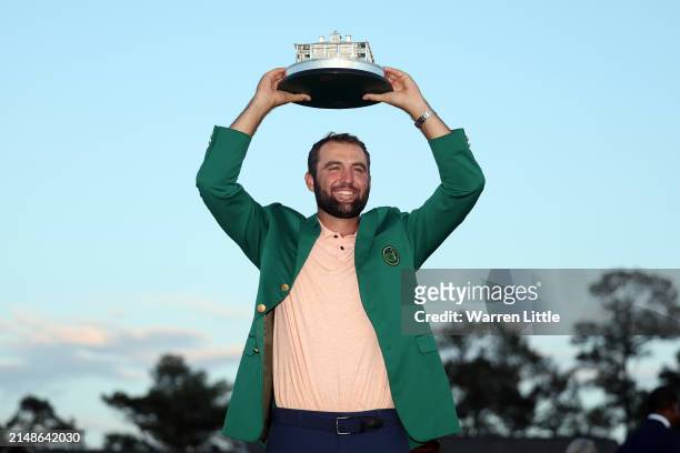 Scottie Scheffler of the United States poses with the Masters trophy after winning the 2024 Masters Tournament at Augusta National Golf Club on April...