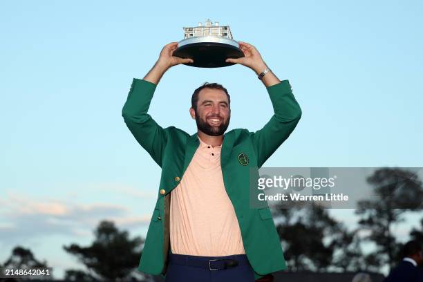 Scottie Scheffler of the United States poses with the Masters trophy after winning the 2024 Masters Tournament at Augusta National Golf Club on April...