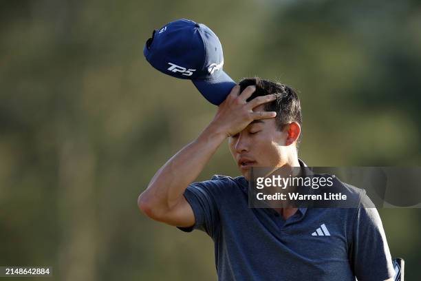 Collin Morikawa of the United States walks off the 18th green after finishing his round during the final round of the 2024 Masters Tournament at...