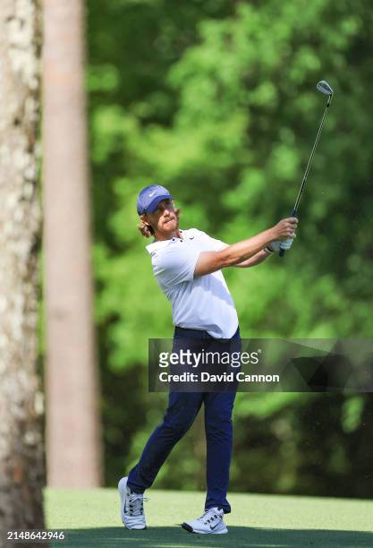 Tommy Fleetwood of England plays his second shot on the 11th hole during the final round of the 2024 Masters Tournament at Augusta National Golf Club...
