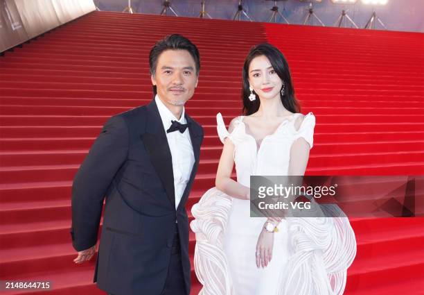 Actor Stephen Fung Tak-lun and actress Angelababy arrive at the red carpet for the 42nd Hong Kong Film Awards at Hong Kong Cultural Centre on April...
