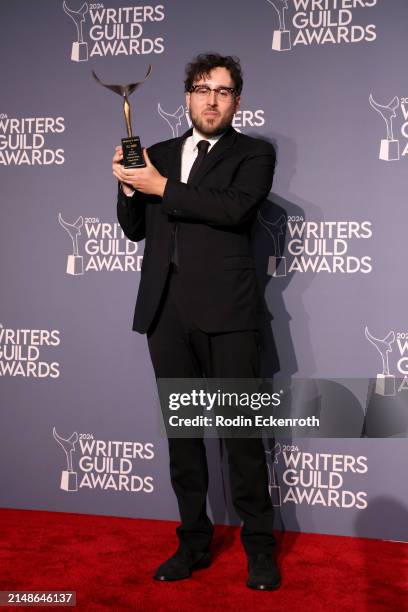 Will Arbery, winner of the "Outstanding Writing Episodic Drama" award for "Living + " poses in the press room during the 2024 Writers Guild Awards...