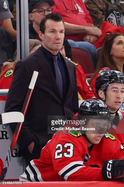 Head coach Luke Richardson of the Chicago Blackhawks looks on against the Carolina Hurricanes during the third period at the United Center on April...