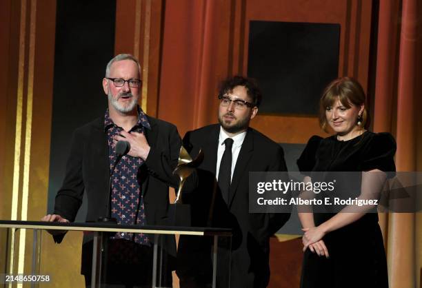 Ted Cohen, Will Arbery, and Miriam Battye accept the "Outstanding Drama Series" award for "Succession" onstage during the 2024 Writers Guild Awards...