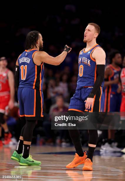 Jalen Brunson and Donte DiVincenzo of the New York Knicks celebrate during the second half against the Chicago Bulls at Madison Square Garden on...