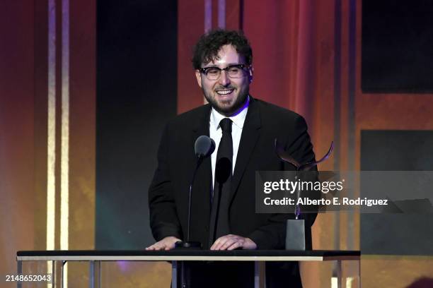 Will Arbery accepts the "Outstanding Writing Episodic Drama" award for "Living + " during the 2024 Writers Guild Awards Los Angeles Ceremony at the...