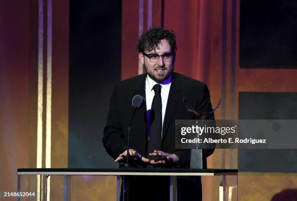 Will Arbery accepts the "Outstanding Writing Episodic Drama" award for "Living + " during the 2024 Writers Guild Awards Los Angeles Ceremony at the...