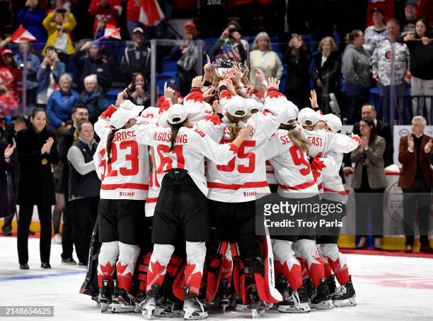 Team Canada raises the Championship Trophy after winning The Gold by defeating The United States in OT during the 2024 IIHF Women's World...