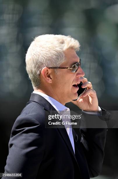 Baltimore Orioles general manager Mike Elias talks on the phone before the game against the Milwaukee Brewers at Oriole Park at Camden Yards on April...