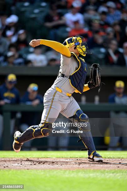 William Contreras of the Milwaukee Brewers throws the ball to second base against the Baltimore Orioles at Oriole Park at Camden Yards on April 13,...