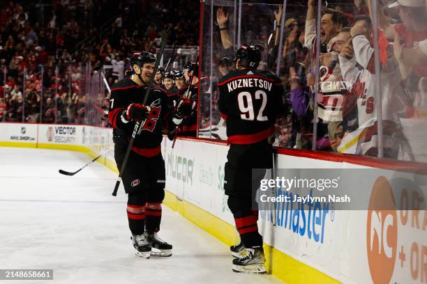 Evgeny Kuznetsov of the Carolina Hurricanes celebrates a goal with Dmitry Orlov during the second period of the game against the Florida Panthers at...