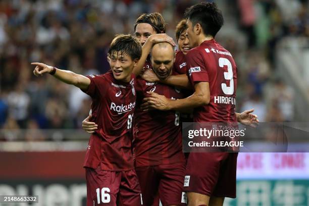 Andres Iniesta of Vissel Kobe celebrates with teammates after scoring the team's first goal during the J.League J1 match between Vissel Kobe and...