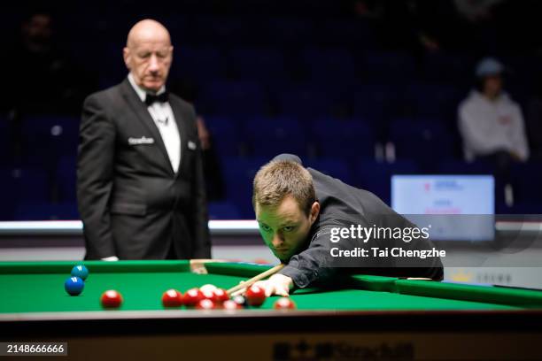 Lukas Kleckers of Germany plays a shot in the third round match against Chris Wakelin of England on day seven of 2024 World Championship Qualifiers...