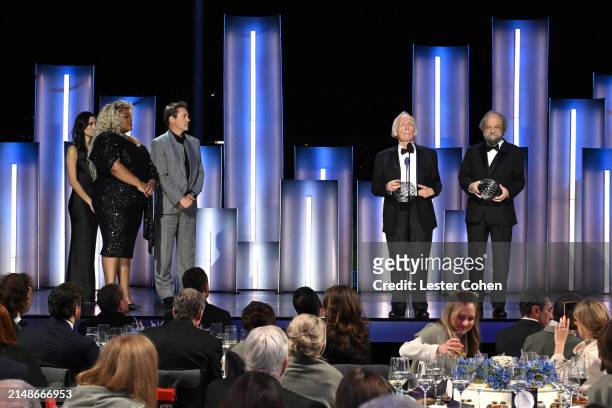 Da'Vine Joy Randolph and Robert Downey Jr., present awards to honorees Dr. John Cardy and Dr. Alexander Zamolodchikov onstage during the 10th...