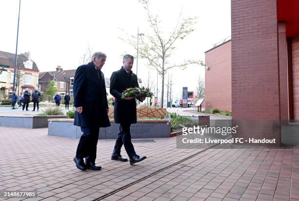 Sir Kenny Dalglish and Billy Hogan laying a wreath at the Hillsborough memorial at Anfield in this handout image provided by Liverpool FC on April...