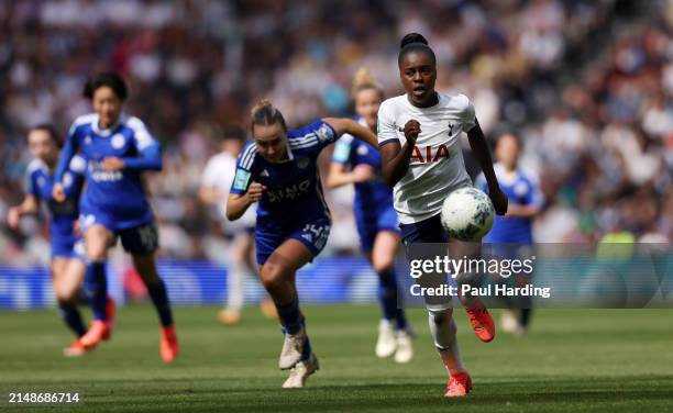 Jessica Naz of Tottenham Hotspur gets away from Josie Green of Leicester City during the Adobe Women's FA Cup Semi Final between Tottenham Hotspur...