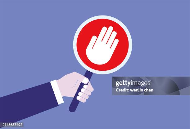 hand holding up prohibition sign - red light stock illustrations