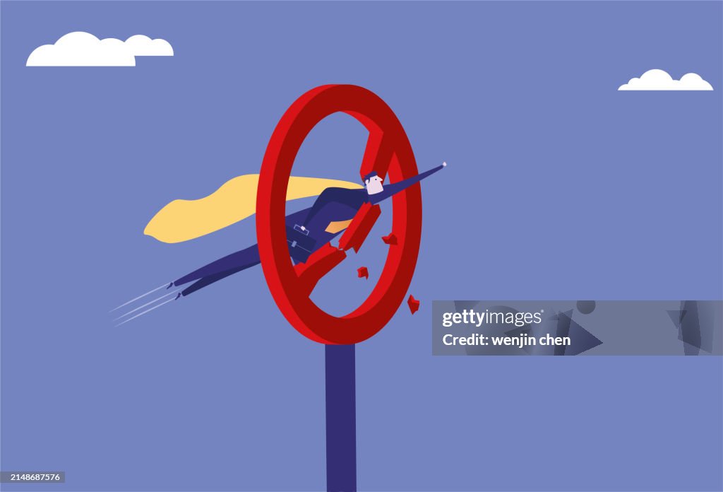 Superman breaks through the prohibition sign