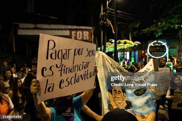 People demonstrate against sexual exploitation of minors in the city of Medellin, Colombia on April 9 after the alleged case of Timothy Alan...