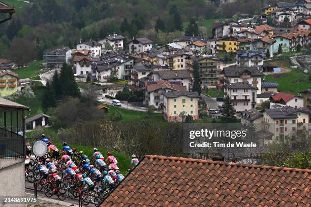 General view of the peloton passing through a Cavedago village during the 47th Tour of the Alps 2024, Stage 1 a 133.3km stage from Neumarkt - Egna to...